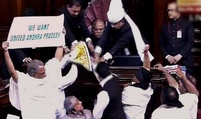 AP-members-protest-for-United-Andhra-Pradesh-in-the-Rajya-Sabha-during-the-extended-winter-session
