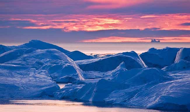 Immense melting icebergs at Isfjeldbanken (the Iceberg Bank), Ilulissat Icefjord, Disko Bay, West Greenland.