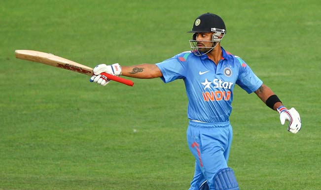 Virat-Kohli-of-India-celebrates-his-half-century-during-the-first-One-Day-International-match-between