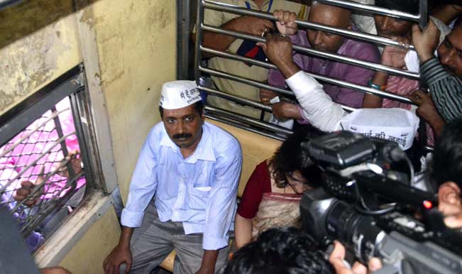 Aam-Aadmi-Party-(AAP)-leader-Arvind-Kejriwal-travels-in-a-coach-of-local-train-from-Andheri-to-Churchgate-in-Mumbai
