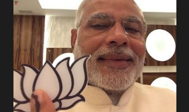 Narendra Modi casts his ballot in Gandhinagar, says elections are like festival Narendra Modi casts his ballot in Gandhinagar, says elections are like festival