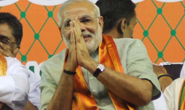 Narendra Modi casts his vote in Gujarat, tweets his selfie Narendra Modi casts his vote in Gujarat, tweets his selfie