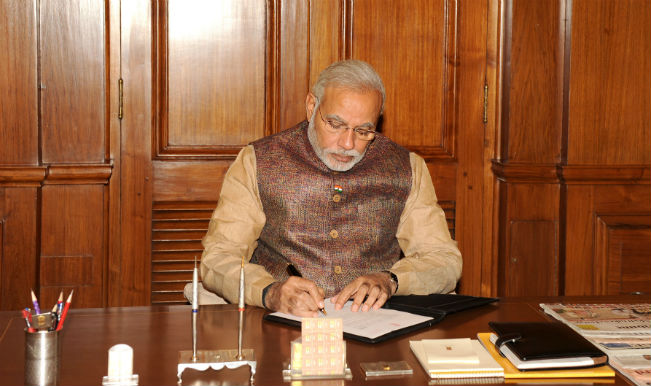 Narendra Modi takes charge as Prime Minister