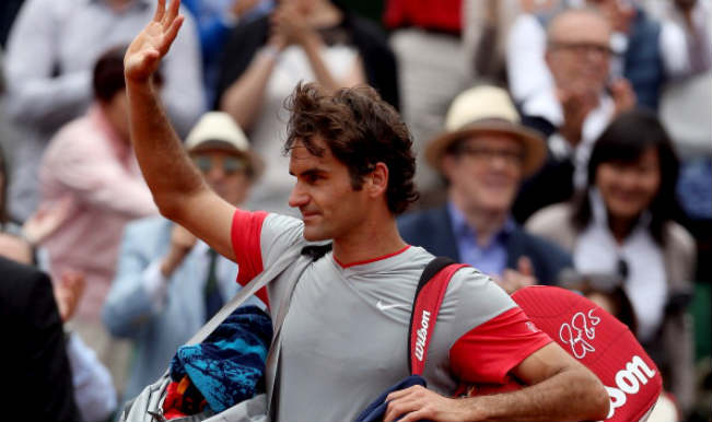 Roger Federer ousted by Ernests Gulbis in the fourth round of French Open 2014 Roger Federer ousted by Ernests Gulbis in the fourth round of French Open 2014