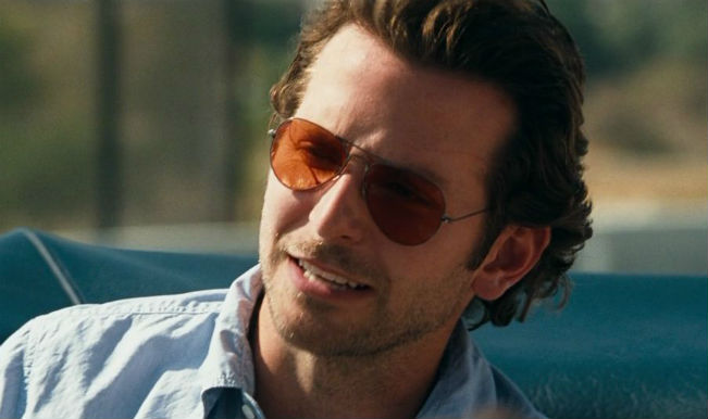 Bradley Cooper learning to flip burgers at Burger King! Bradley Cooper learning to flip burgers at Burger King!