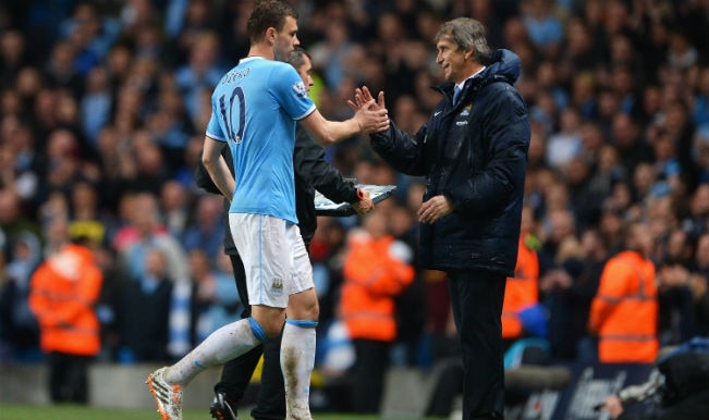 Manchester City manager Manuel Pellegrini admits his squad aren't ready for title defence