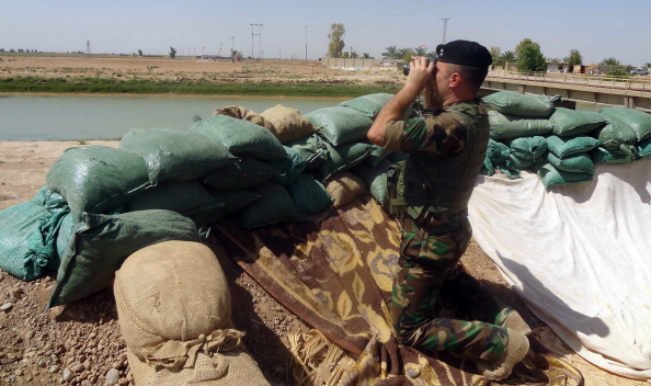 retake Iraq's largest dam from jihadist fighters