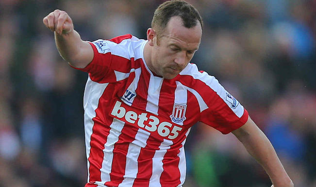 Charlie Adam scores spectacular goal; Chelsea beat Stoke City 2-1.