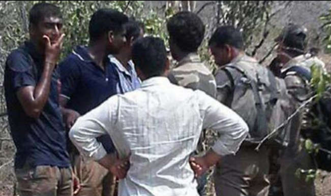 At least 20 killed as police open fire on smugglers in Andhra.