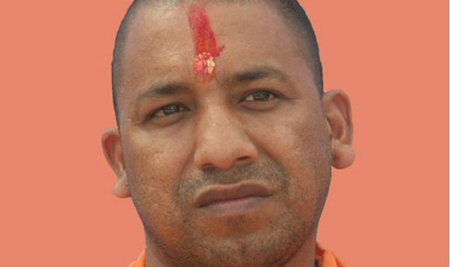 Varanasi, Jun 9: Firebrand BJP leader Yogi Adityanath has stoked a controversy with his remarks that those opposing &#39;surya namaskar&#39; should “drown in the ... - yogi-adityanath2