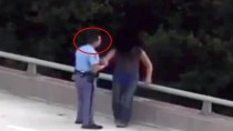 This policeman saves a guy from suicide by just hugging him!