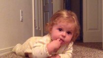 Something funny in the mouth? Baby discovers she has a tongue! (Watch video)