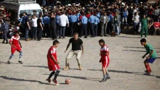 David Beckham plays soccer with Nepalese children David Beckham plays soccer with Nepalese children