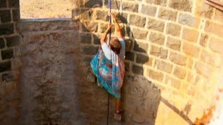 In this village, women jump into wells daily to draw water using cups and jugs! In this village, women jump into wells daily to draw water using cups and jugs!