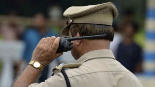 Police prevents freedom fighter from jumping into Yamuna Police prevents freedom fighter from jumping into Yamuna