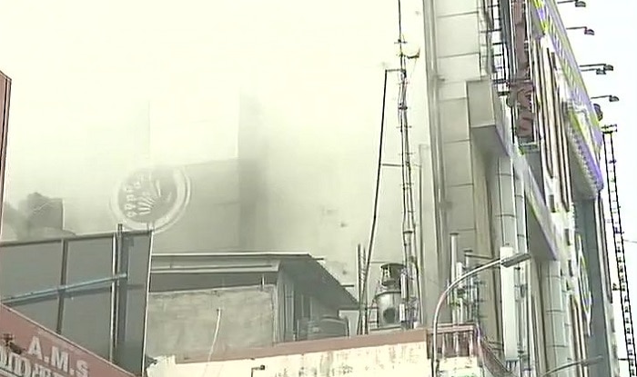 Building collapses hours after fire engulfs textile showroom Building collapses hours after fire engulfs textile showroom