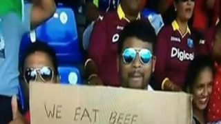 Tamilian holds ‘We eat beef’ placard‘ during India vs West Indies 2nd ODI Tamilian holds ‘We eat beef’ placard‘ during India vs West Indies 2nd ODI