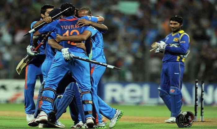 As India celebrates then Sri Lanka skipper Kumar Sangakkara looks