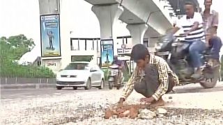 Ravi Teja 12-Year-Old Boy Fills Potholes After Witnessing a Toddler Die Due to Accident on the Hyderabad Road (Watch video) Ravi Teja 12-Year-Old Boy Fills Potholes After Witnessing a Toddler Die Due to Accident on the Hyderabad Road (Watch video)