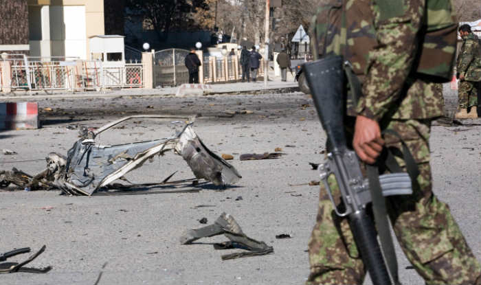 The Latest: Taliban stalk hospital killing wounded police The Latest: Taliban stalk hospital killing wounded police