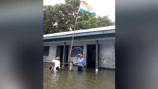 This Assam School Hoisted The National Flag On Independence Day in Flood Waters, Facebook Pic Goes Viral This Assam School Hoisted The National Flag On Independence Day in Flood Waters, Facebook Pic Goes Viral