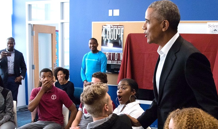 Barack Obama surprises students with visit to DC school