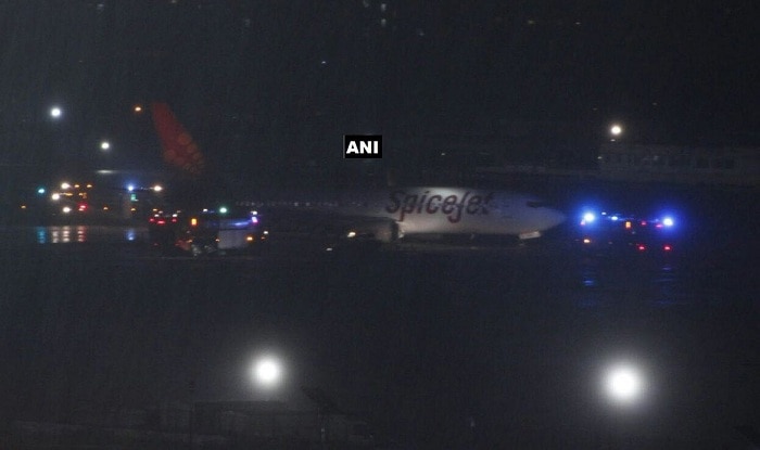 Spicejet flight skids at Mumbai airport runway , stuck in mud Spicejet flight skids at Mumbai airport runway , stuck in mud