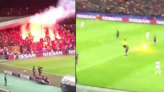 Referee Narrowly Escapes Burning Flare During Champions League Match, Watch Video Referee Narrowly Escapes Burning Flare During Champions League Match, Watch Video
