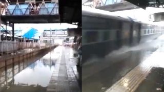 Mumbai Rains: Train Races Through Flooded Tracks At Nallasopara Station, Splashes Water on Commuters (Watch Video) Mumbai Rains: Train Races Through Flooded Tracks At Nallasopara Station, Splashes Water on Commuters (Watch Video)