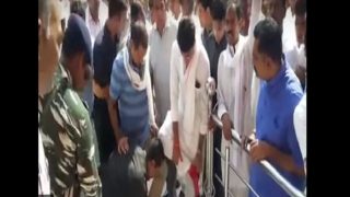 Rajasthan Congress Leader Misuses Power, Asks Security Guard to Take off His Shoes at Temple- Watch Video Rajasthan Congress Leader Misuses Power, Asks Security Guard to Take off His Shoes at Temple- Watch Video