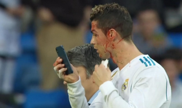 Image result for ronaldo mobile in the  pitch