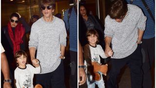 Shah Rukh Khan Returns Back To The Bay With Son AbRam After His Swiss Vacation Shah Rukh Khan Returns Back To The Bay With Son AbRam After His Swiss Vacation
