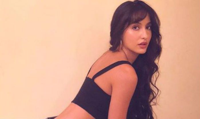 Nora Fatehi Shakes Her Booty While Dancing And Getting Her Glam On With Her Make Up Artist