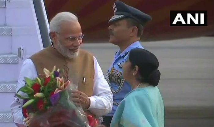 Prime Minister Narendra Modi being received by External Affairs Minister Sushma Swaraj in Delhi on Saturday