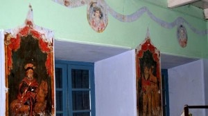 Fading murals juxtaposed with modern living Fading murals juxtaposed with modern living