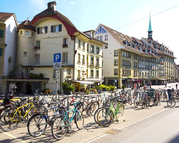 21Switzerland-Bern-parked-bicycles-shutterstock_339973046