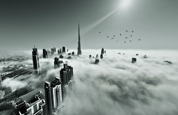 Dubai-Burj-Khalifa-covered-in-early-morning-fog-shutterstock_166203821