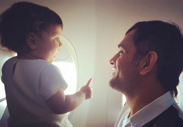 Photos of MS Dhoni and Ziva on an airplane are the cutest thing you ...