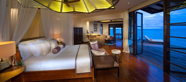 jumeirah-vittaveli-water-villa-bedroom-hero