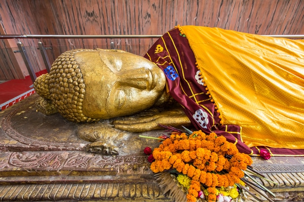 Reclining Buddha gold statue at the Mahaparinirvana Temple