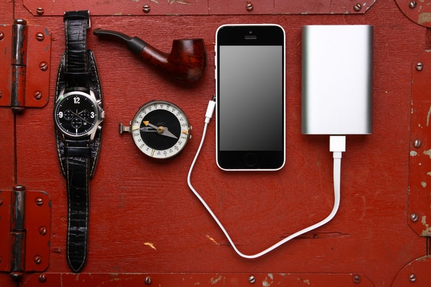 Power bank, phone, watch, compass and tobacco pipe