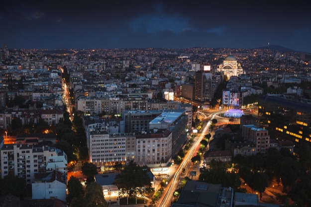 Aerial night view of old Belgrade, capital of Serbia with Slavija Square, St.Sava Temple and Avala Tower in the background