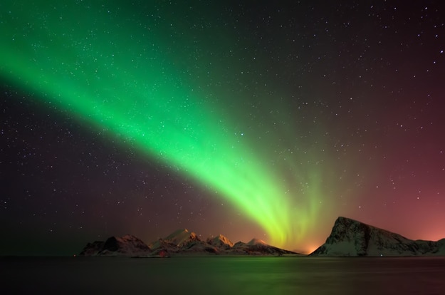 Aurora borealis above snowy islands of Lofoten (2)