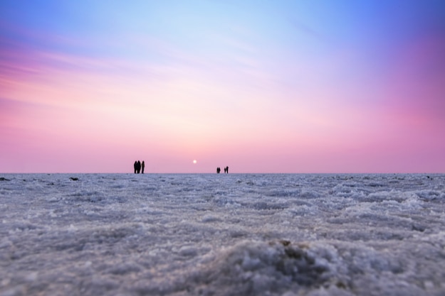 Beautiful multicolored sunset landscape silhouette of the Great Rann of Kutch, Gujarat