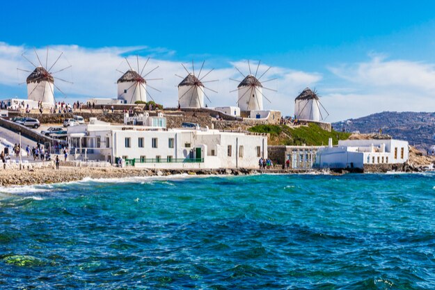 Famous windmills viewpoint during a clear and bright summer sunny day, Mykonos, Greece
