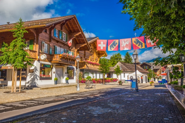 Old city center of Gstaad town, famous ski resort in canton Bern, Switzerland