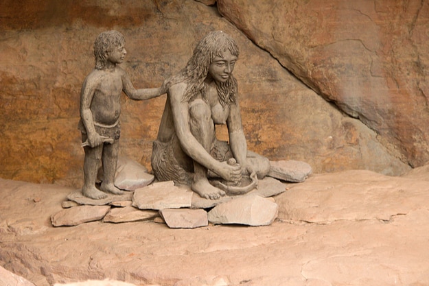 Sculptural depiction of life of prehistoric cave dwellers at Bhimbetka near Bhopal, Madhya Pradesh