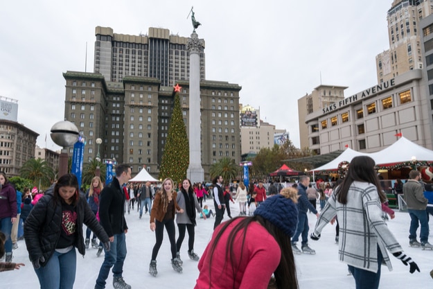 Holiday shoppers enjoy the ice skating rink in Union Square