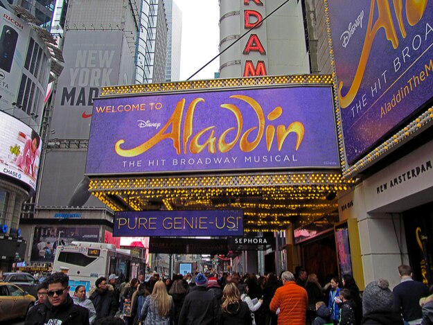The marquee of Disney's Aladdin, A Hit Broadway Musical, which is playing at the New Amsterdam Theatre