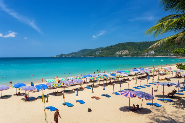 relaxing on Patong beach during a sunny day in Phuket,Thailand
